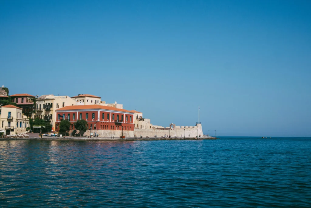 pexels-photo-13900750-13900750 Picturesque waterfront view of Chania town in Crete, Greece with clear blue skies.